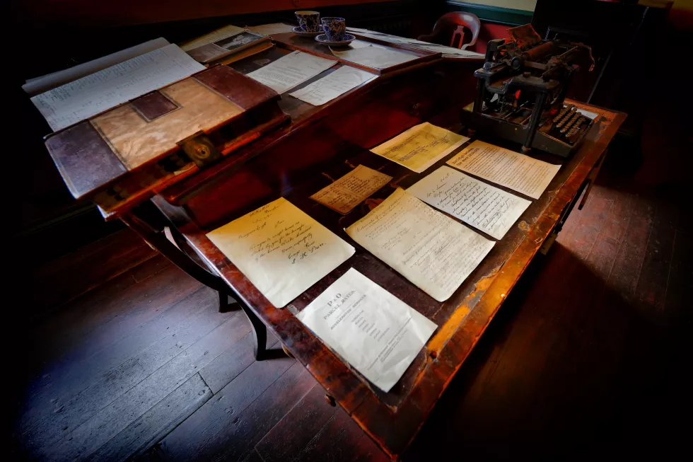 high-angle-view-papers-with-typewriter-table