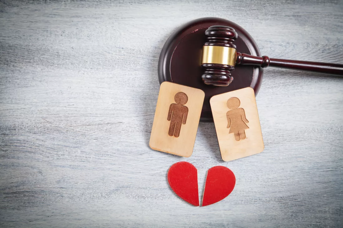 concept-divorce-male-female-wooden-symbols-red-heart-judge-gavel