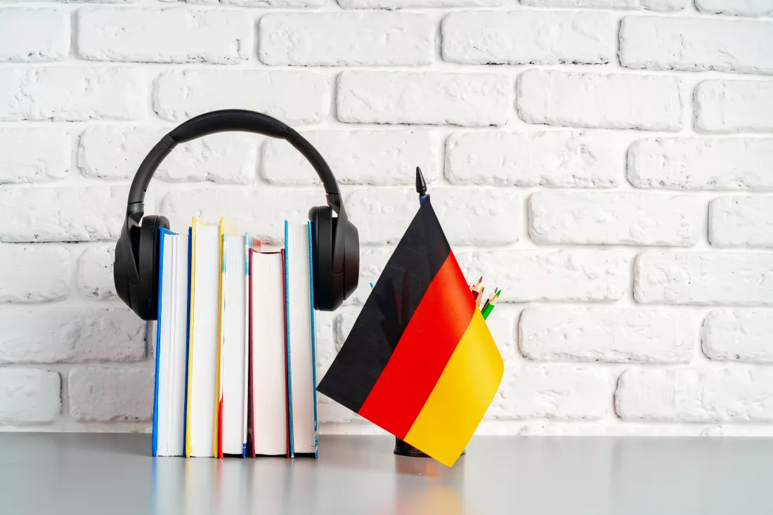 stack-books-flag-germany-desk-german-language-learning-concept(4)
