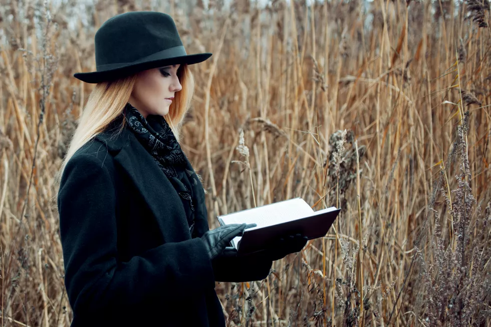 portrait-young-attractive-woman-black-coat-hat