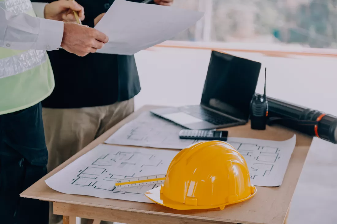 diverse-team-specialists-use-tablet-computer-construction-site-real-estate-building-project-with-civil-engineer-architect-business-investor-general-worker-discussing-plan-details
