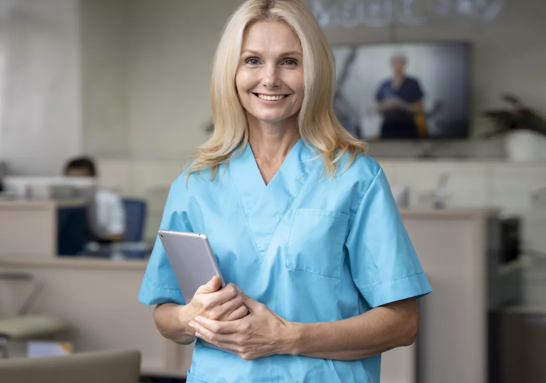 medium-shot-smiley-woman-holding-tablet
