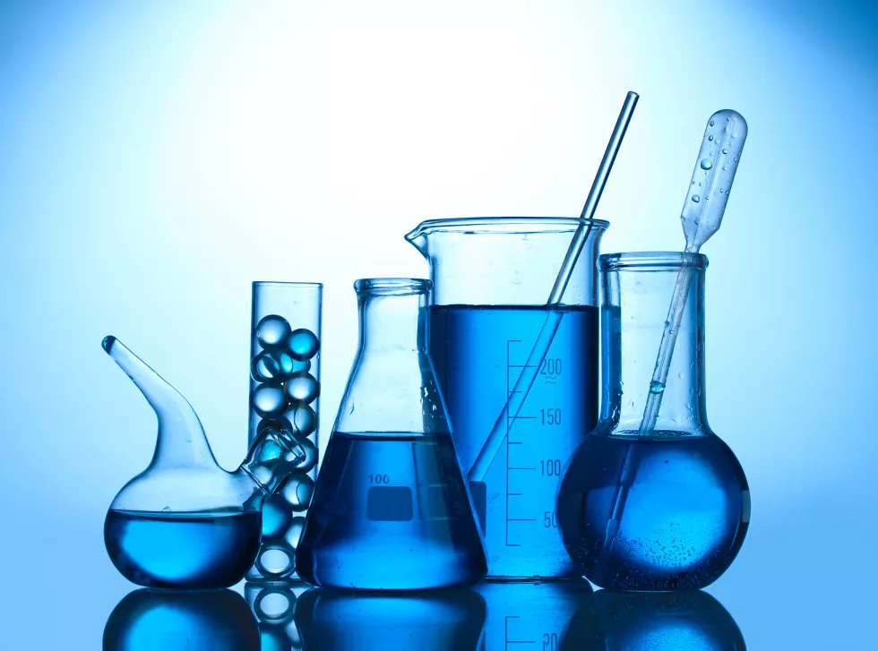 testtubes-with-blue-liquid-blue-background