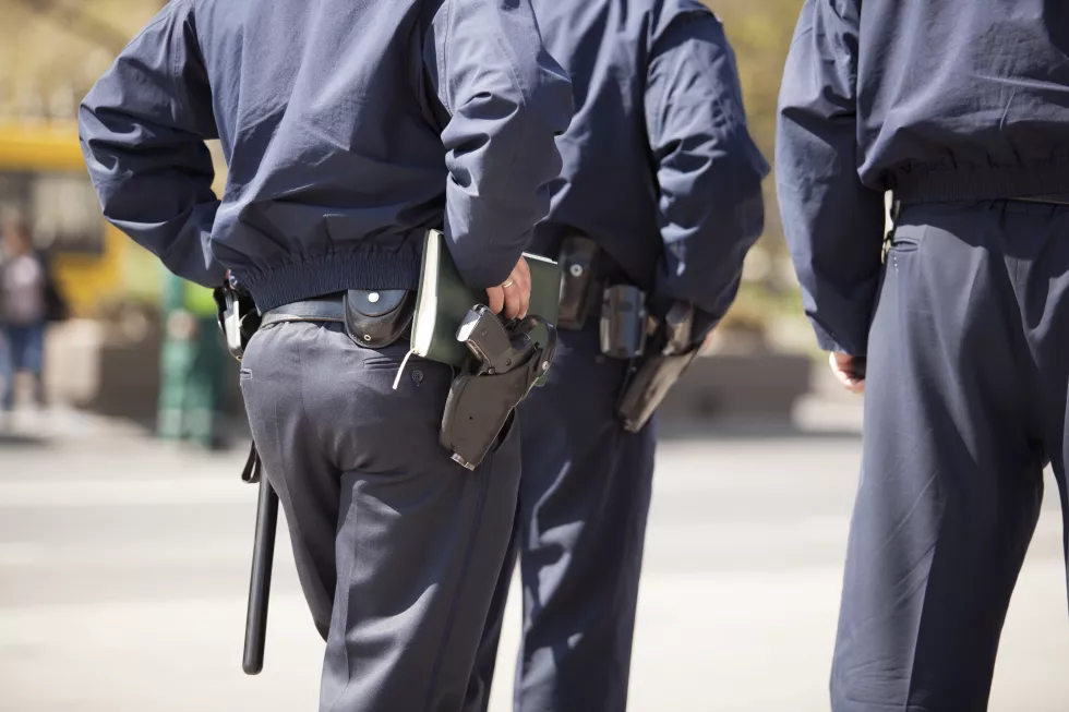rear-midsection-police-force-street