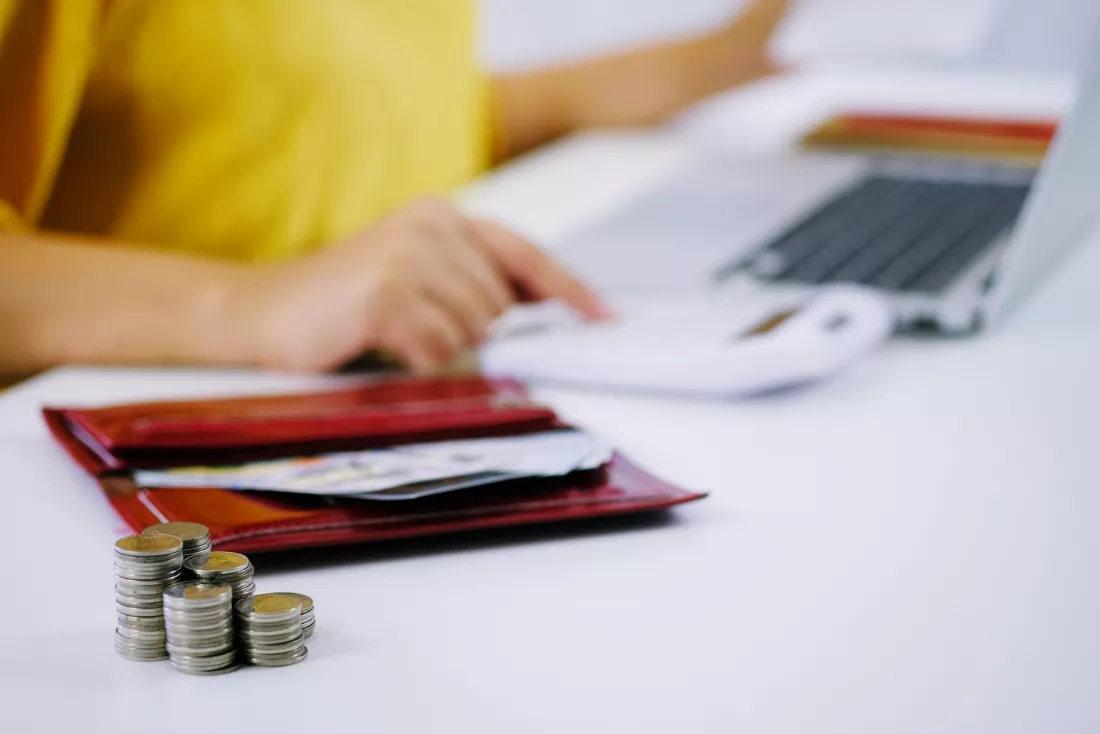 woman-entrepreneur-calculating-cost-economic-budget-saving-investment-concept