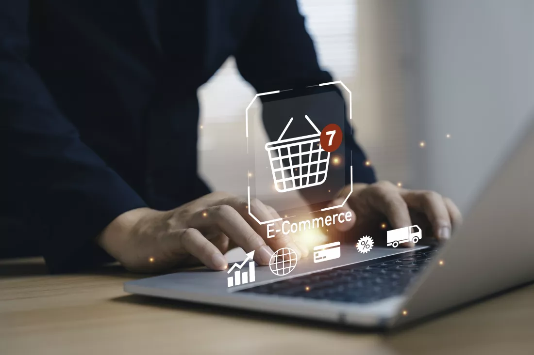 businessman-using-laptop-with-online-shopping-cart-interface-digital-devices-showing-global-retail-transaction-mobile-payment-business-growth-modern-online-marketplace-e-commerce-concept