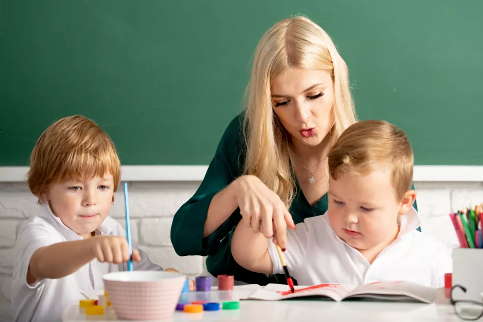 mother-two-son-together-draw-paint-mom-helps-children-boys-teacher-helps-school-kids-lear