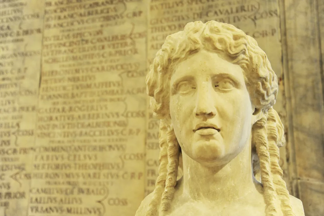 herm-apollo-background-some-ancient-roman-inscription-blurred-rome-italy