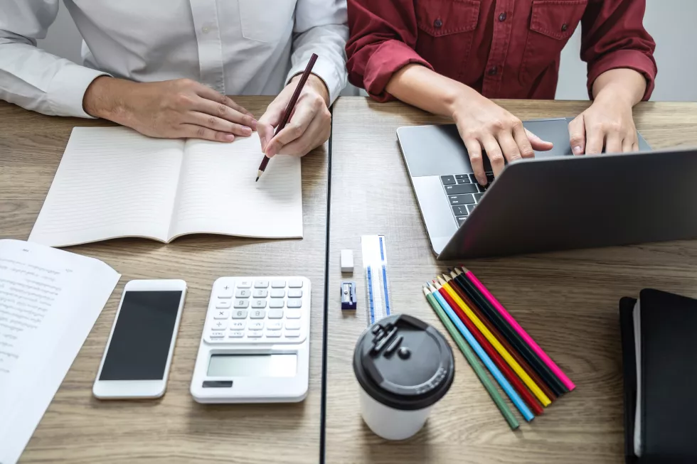 high-angle-view-people-working-table-office