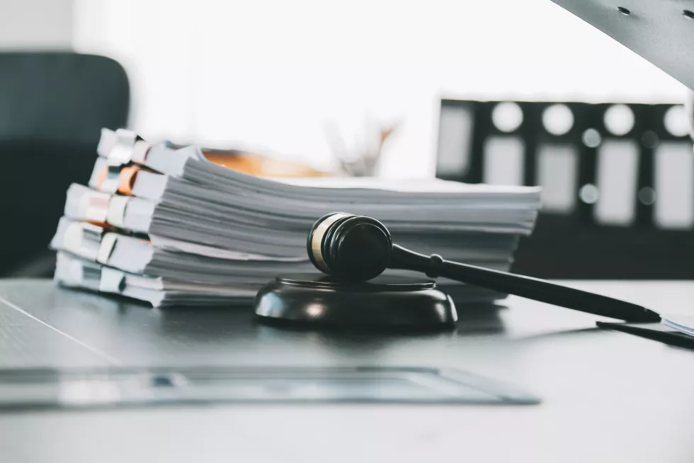 business-lawyers-discussing-contract-papers-with-brass-scale-desk-office-law-legal-services-advice-justice-law-concept-picture-with-film-grain-effect(2)