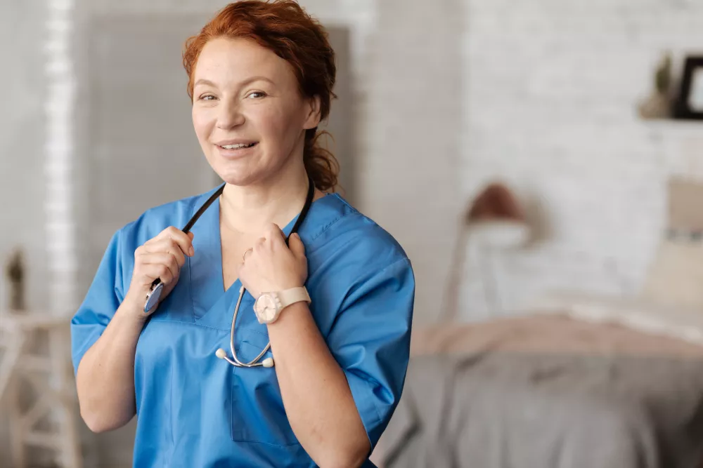 stunning-qualified-motivated-charismatic-gentle-woman-providing-medical-services-home-while-using-professional-equipment-wearing-special-uniform