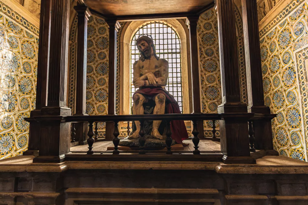 low-angle-view-statue-temple-against-building