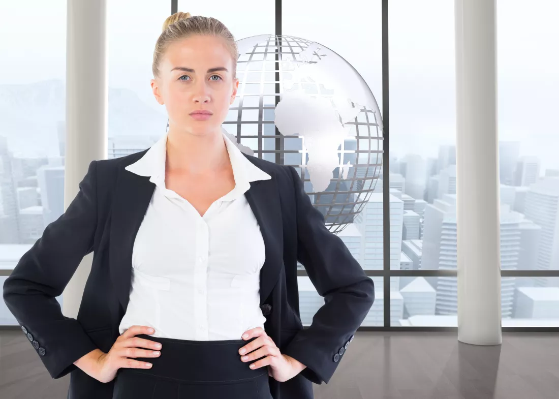 composite-image-blonde-businesswoman-standing-with-hands-hips