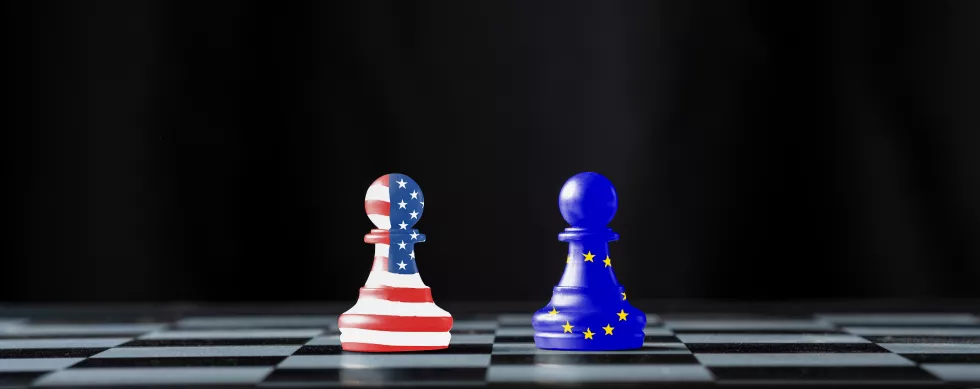 chess-pieces-with-flags-against-black-background
