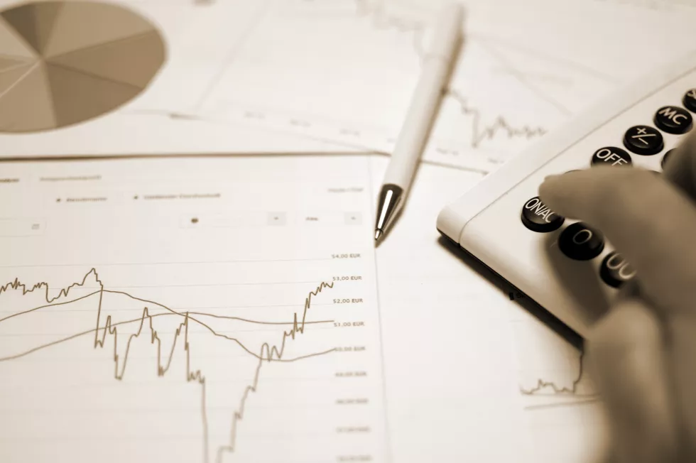 cropped-hands-business-person-with-documents-desk-office