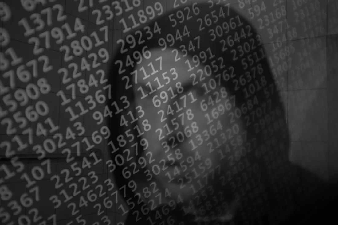 double-exposure-man-with-binary-codes