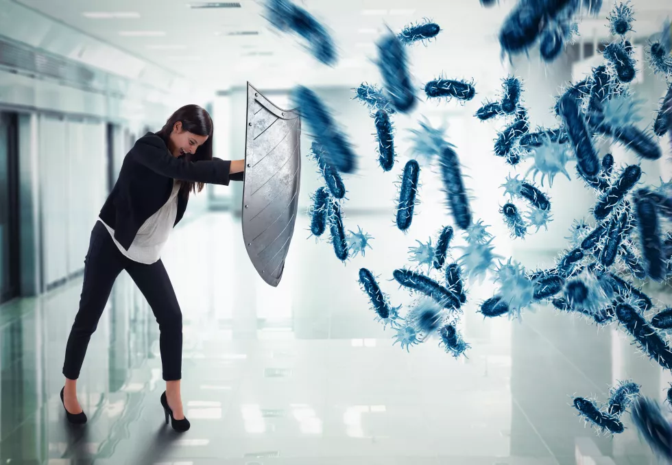 3d-rendering-woman-protects-with-shield-by-attack-bacteria