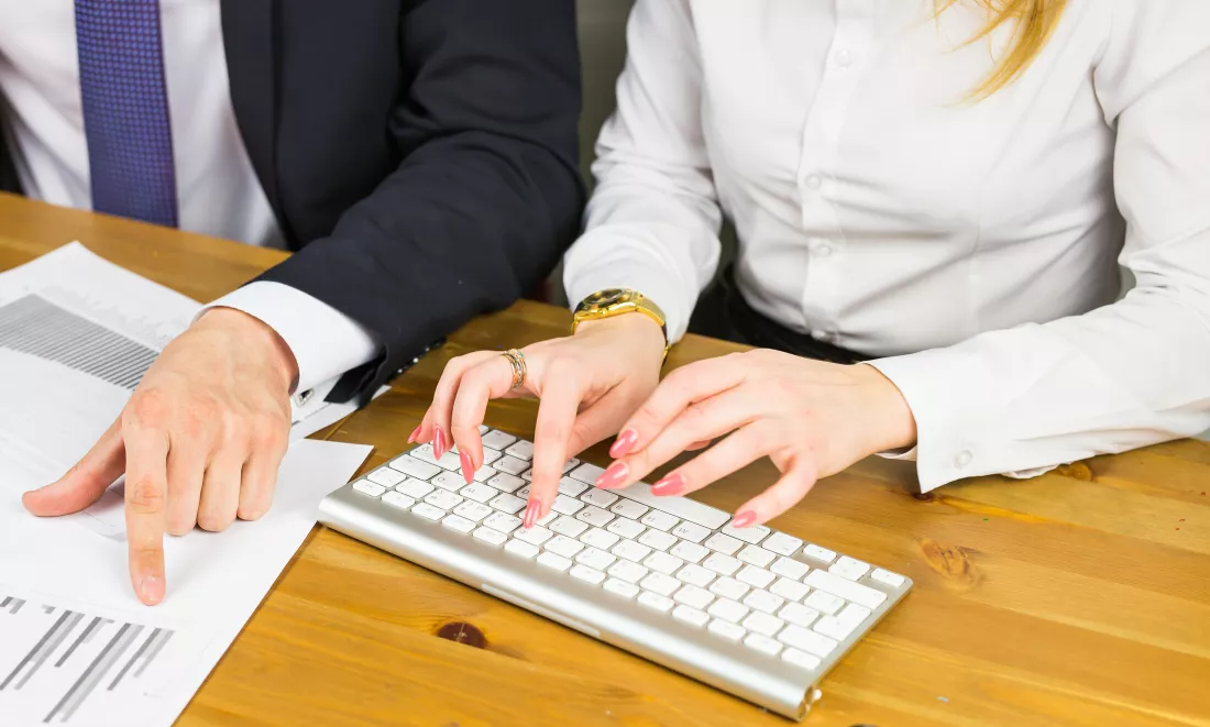 low-section-people-working-table